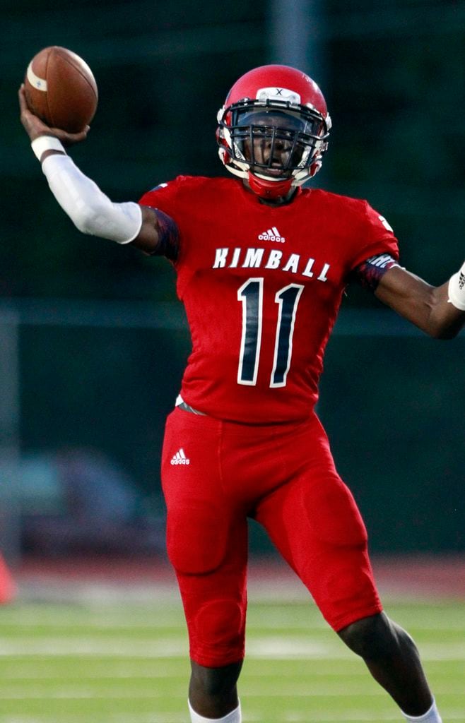 Kimball QB Keith Hargrave (11) throws a pass during the first half of the Irving Vs. Kimball...