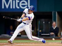 Texas Rangers batter Corey Seager (5) strikes out against Los Angeles Angels starting...