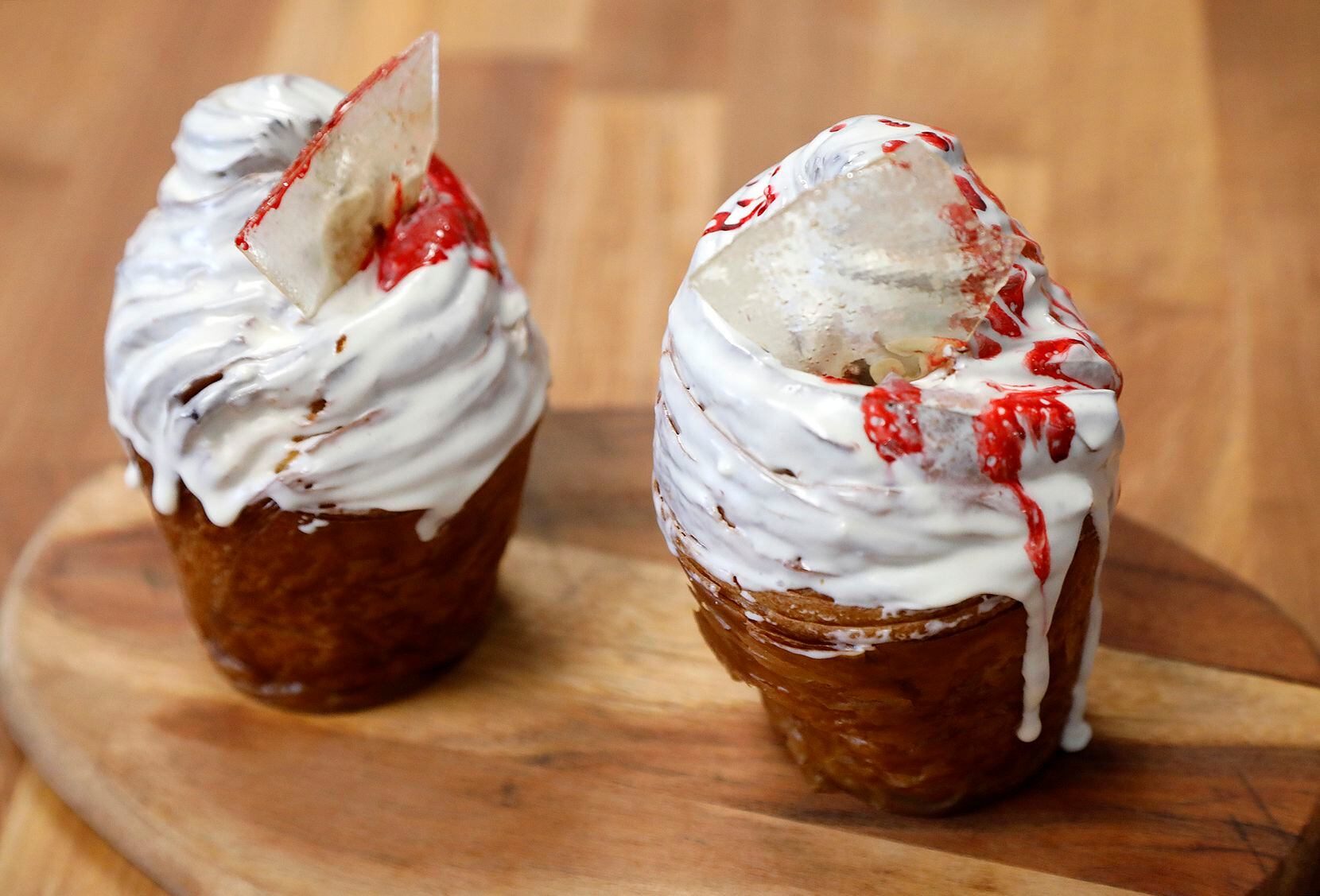 Cruffins, made with rasberry curd, white chocolate glaze, and candy glass at La Casita Bakeshop