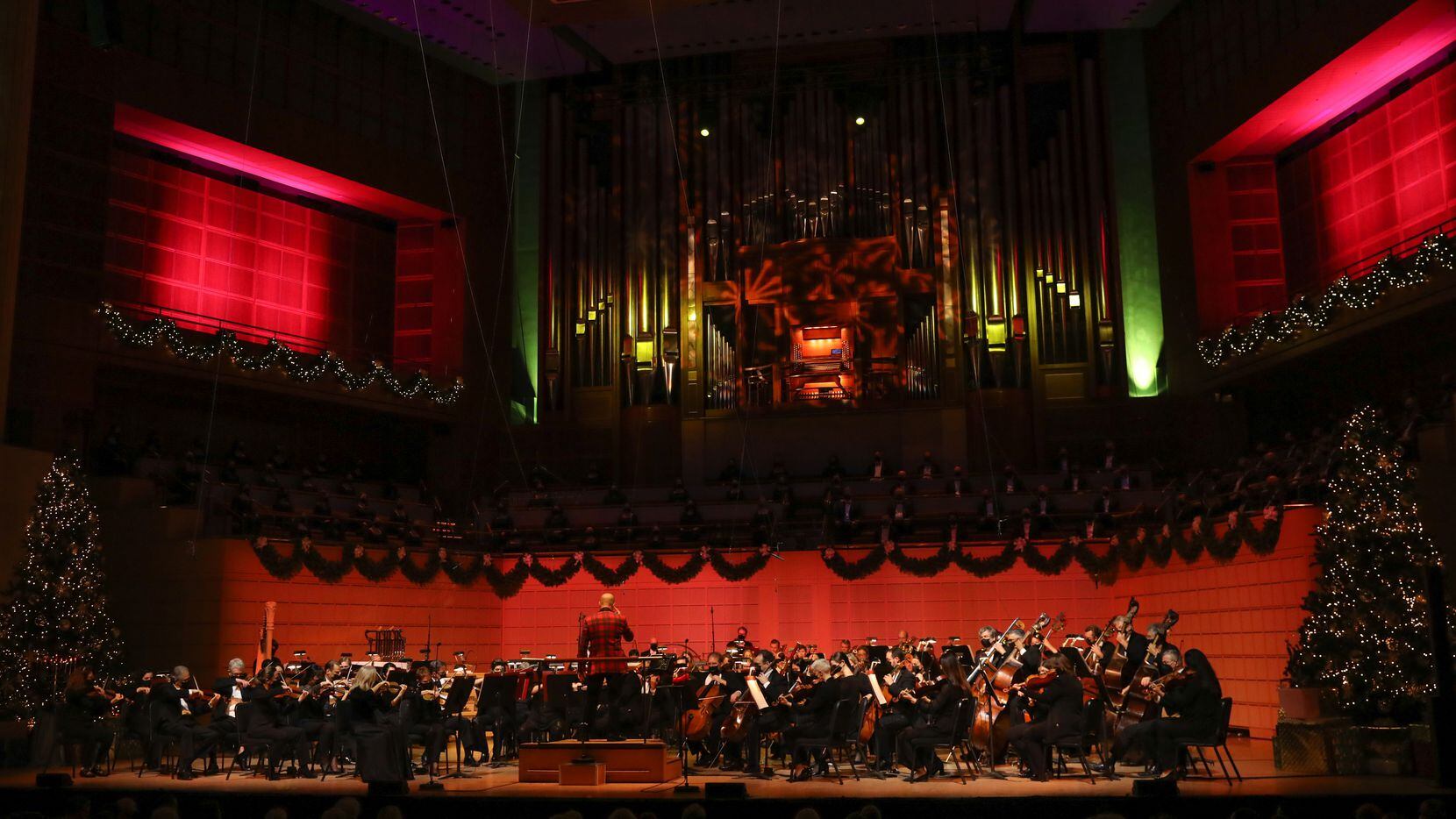 The Dallas Symphony Orchestra performs "March of the Toys" from Babes in Toyland with an accompanying light show at the Dallas Symphony Christmas Pops concert on Dec. 3, 2021.