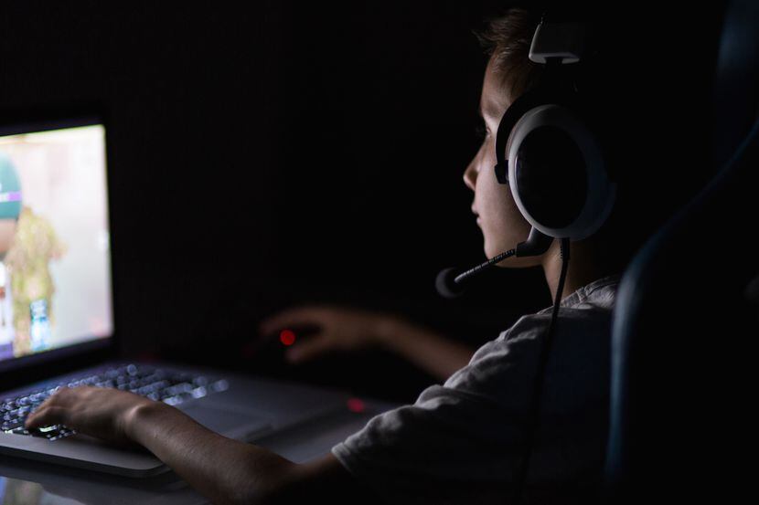 teenage boy playing games and having fun