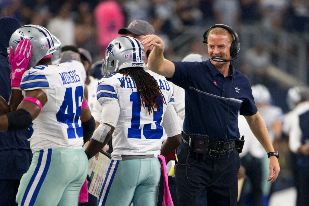 Dallas Cowboys head coach Jason Garrett celebrates touchdown with players during the NFL...