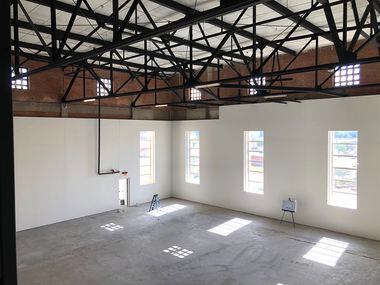 The third floor office space in the building has more than 30-foot ceilings.