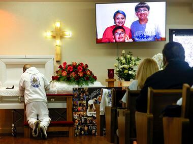 Photos of late Gabriel Zamora is displayed on the screen as Miguel Zamora, father of gets...