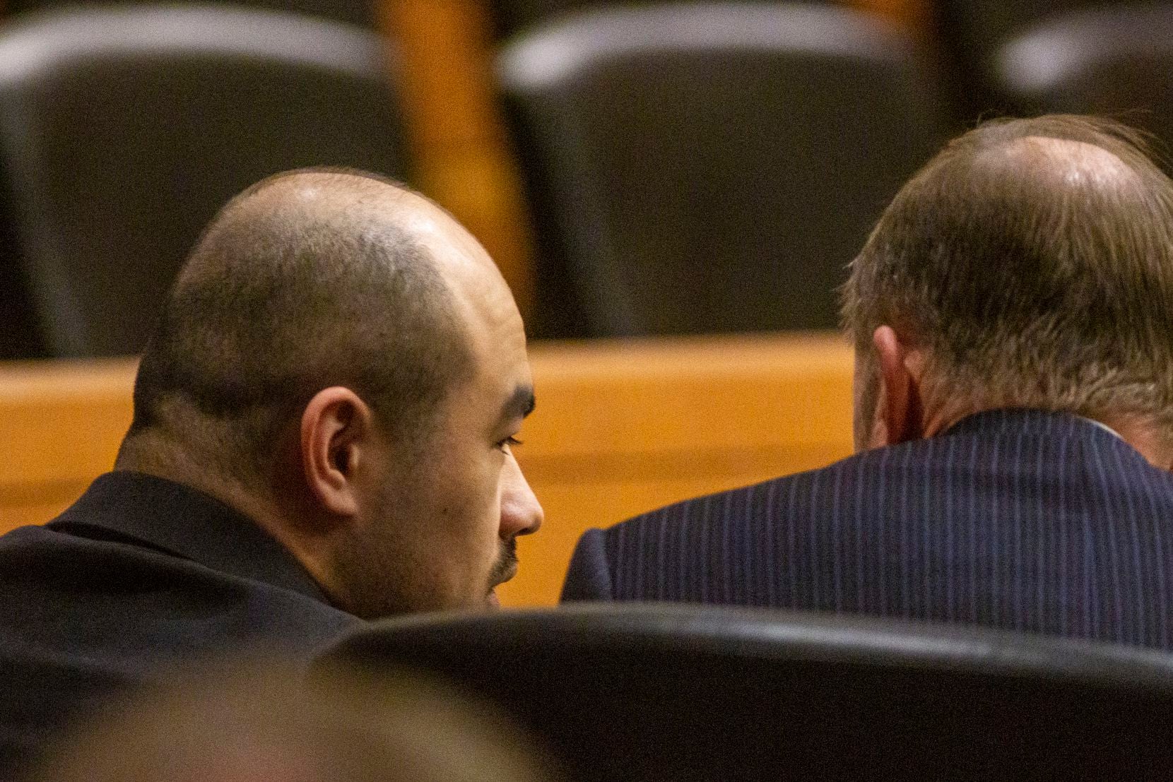 Brandon McCall (left) spoke with his defense attorney after a guilty verdict was announced...