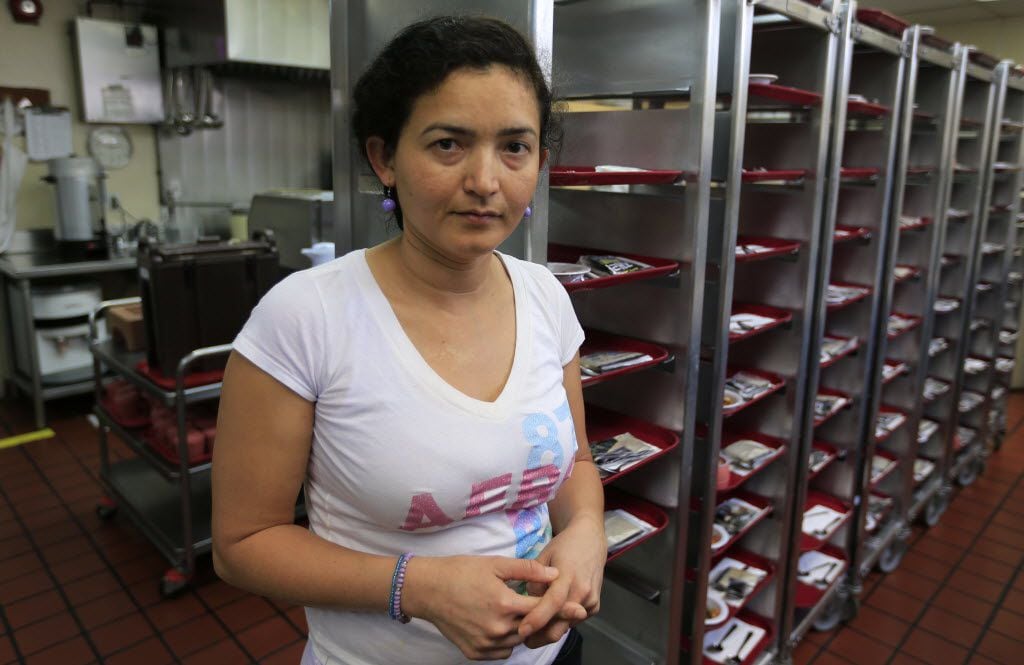 Marissa Avila, 36, a single-parent mother, earns $11.20 per hour as a dish washer at...