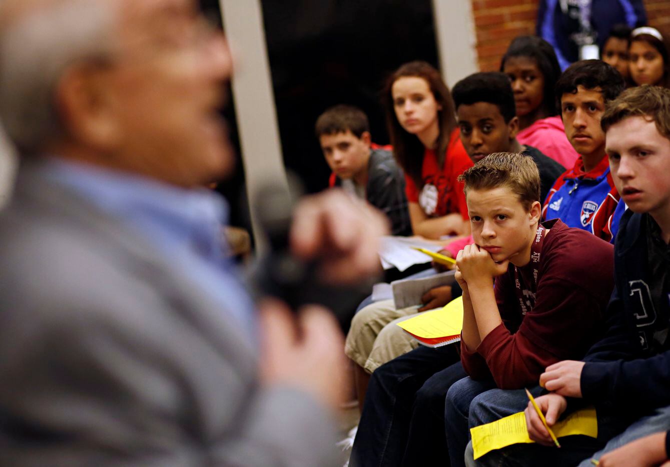 Students at Ford Middle School in Allen, Texas listen to a talk by Max Glauben in March,...
