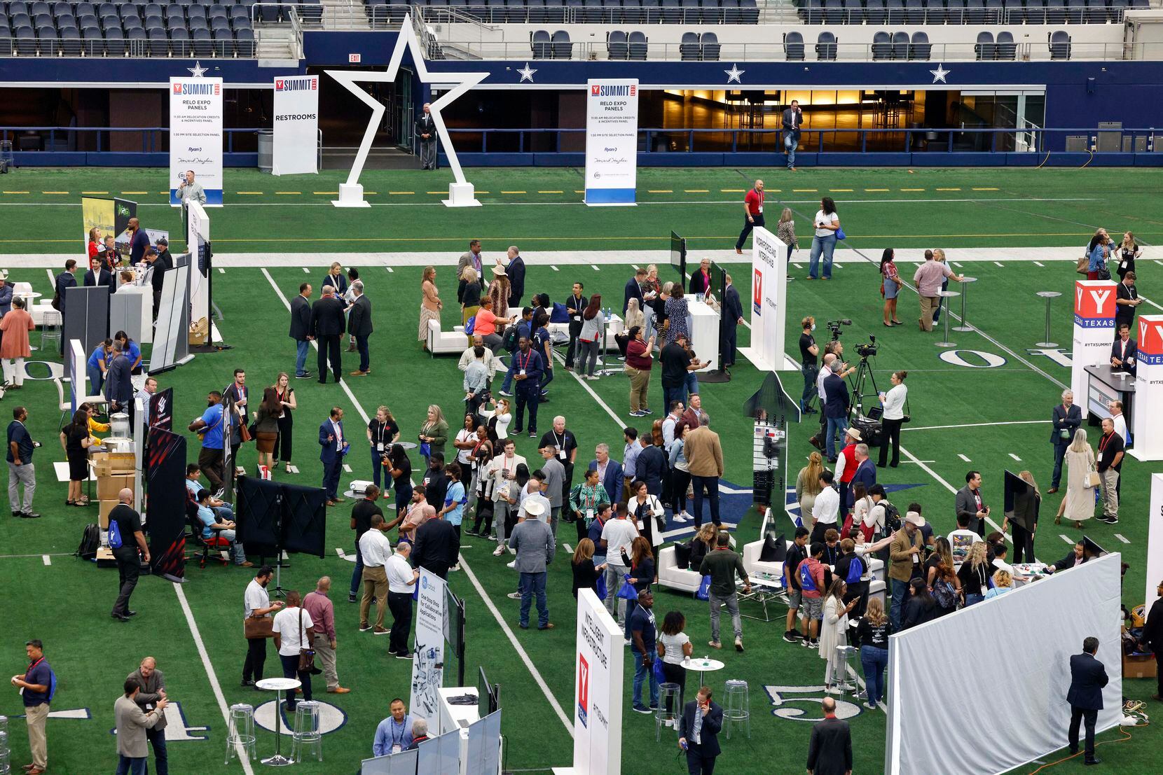 Attendees visit various booths during the 2022 YTexas Summit.