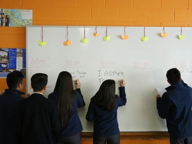 Freshman students work on their vocabulary in the classroom of Kathryne Brodie at Cristo Rey...