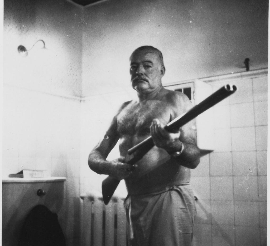 Ernest Hemingway on guard at Finca Vigia, his home outside Havana. The Cuban Revolution led...