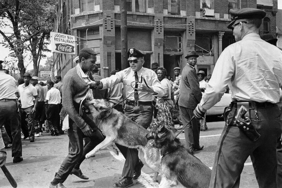 In this May 3, 1963 file photo, a 17-year-old civil rights demonstrator, defying an...