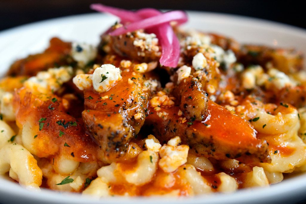 Melty, cheesey goodness: the buffalo chicken mac 'n cheese at Stonedeck comes with chicken,...
