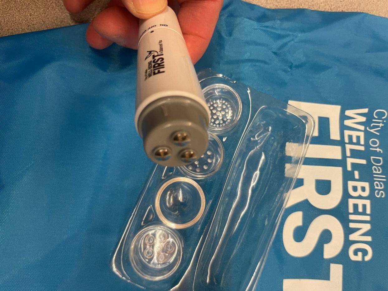 A photo shows a mini massager given to city of Dallas employees in August 2022 to promote...