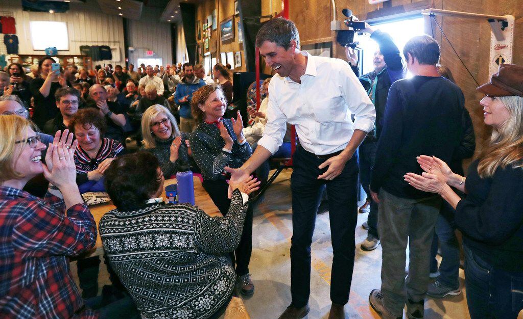 Former Texas Congressman Beto O'Rourke shakes hands during a campaign stop at a brewery in Conway, N.H., Wednesday, March 20, 2019. O'Rourke announced last week that he'll seek the 2020 Democratic presidential nomination.