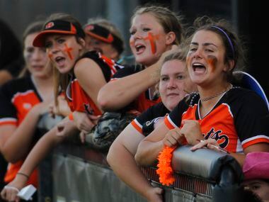 Rockwall players vocalize their support from the team dugout during the top of the second inning of play against Mansfield. The two teams played their Game 2 of a best-of-3 Class 6A area round playoff softball game at Mansfield High School in Mansfield on May 7, 2021.