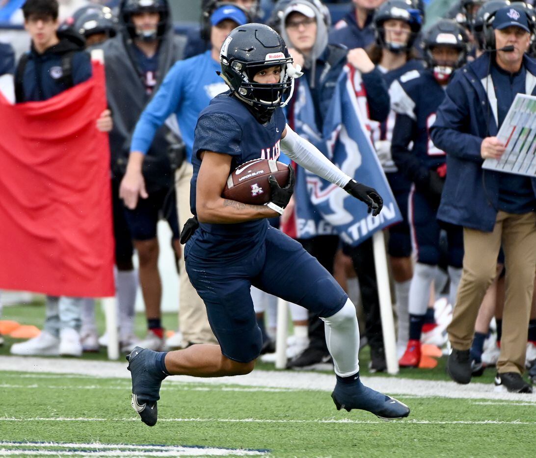 Allen's Jordyn Tyson (4) runs upfield after making a catch in the first half of Class 6A Division I Region I semifinal playoff game between Allen and Euless Trinity, Saturday, Nov. 27, 2021, in Allen, Texas. (Matt Strasen/Special Contributor)