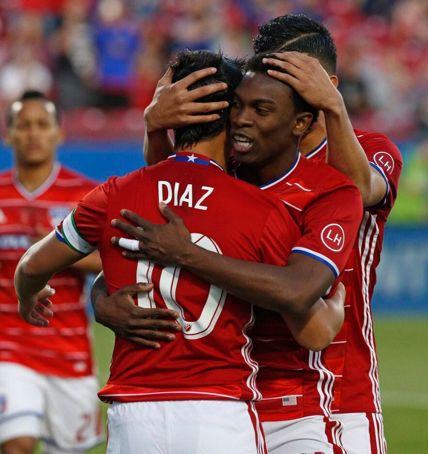 FC Dallas midfielder Mauro Diaz (10) is congratulated after a goal against Seattle Sounders...