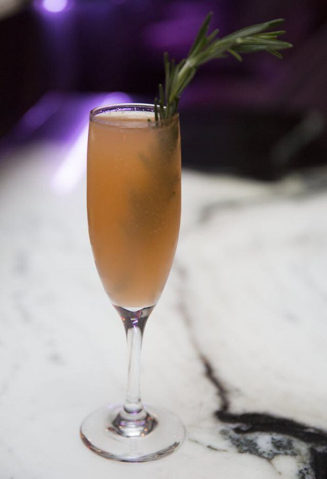 Uptown's new bar Citizen, offers a cocktail, By Land or By Sea, including Rosemary infused...