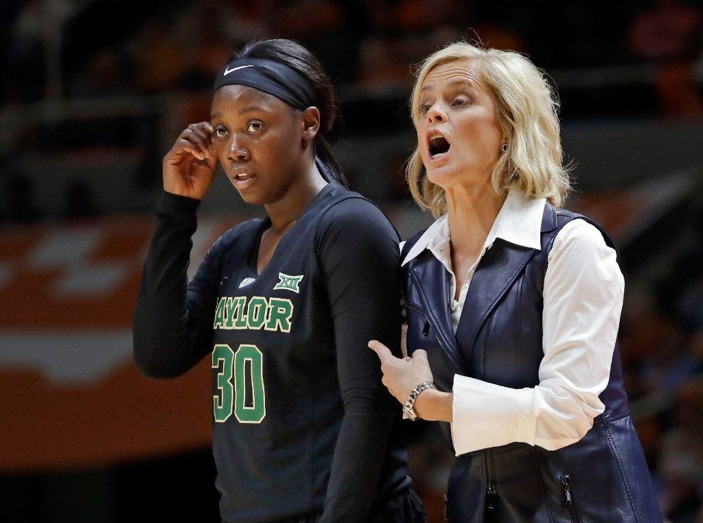 Baylor head coach Kim Mulkey yells to her players as guard Alexis Jones (30) stands by in...