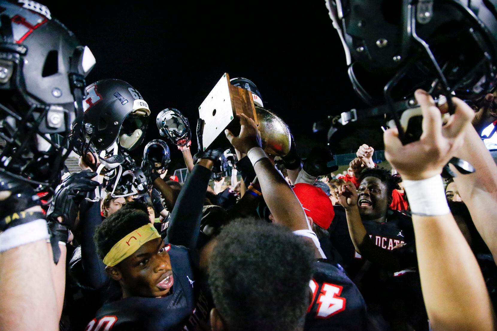 Lake Highlands celebrates a 29-24 win over South Grand Prairie after a Class 6A Division I...