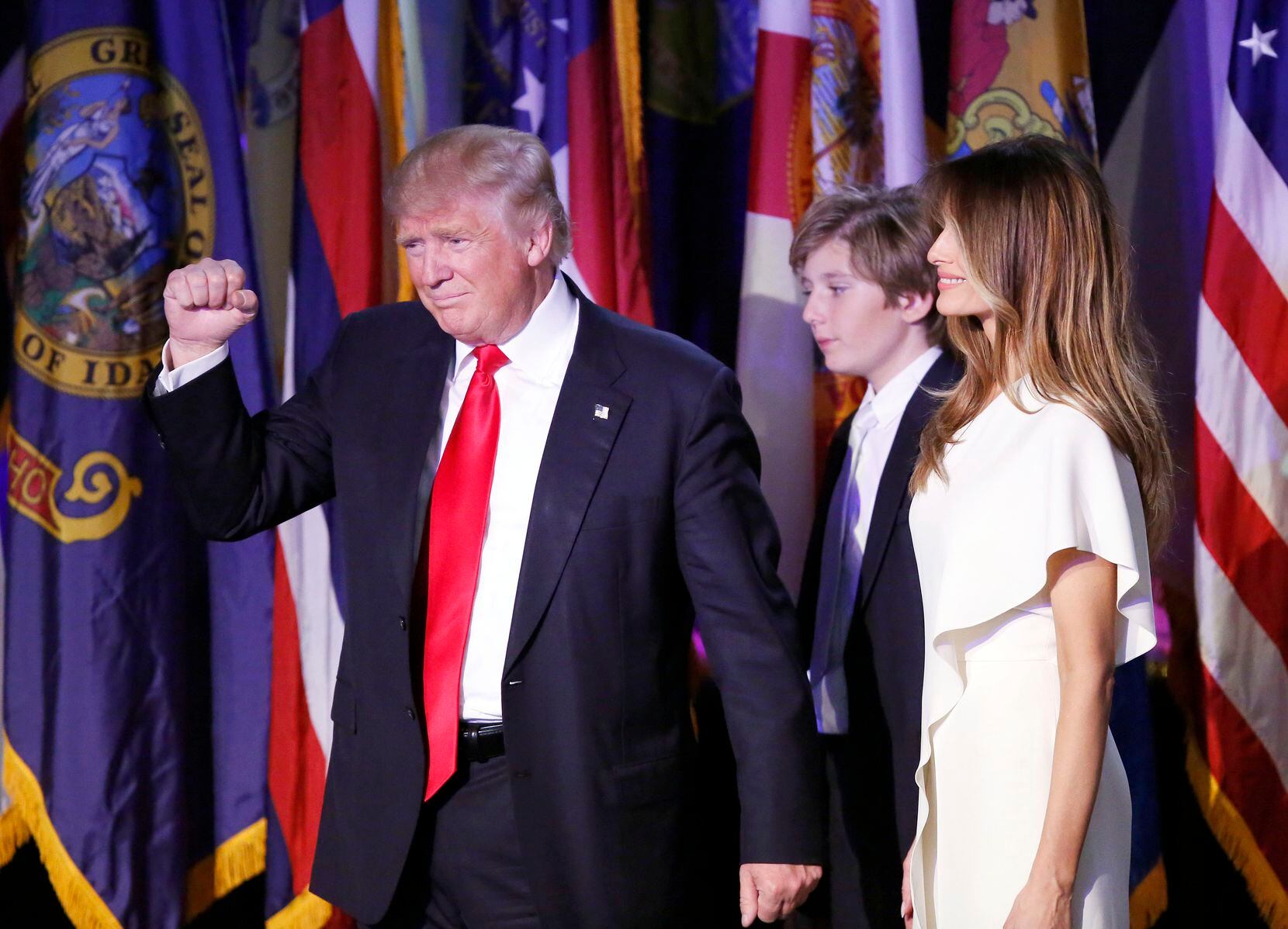Donald Trump, onstage with his wife, Melania, and son Baron, acknowledged a crowd of...