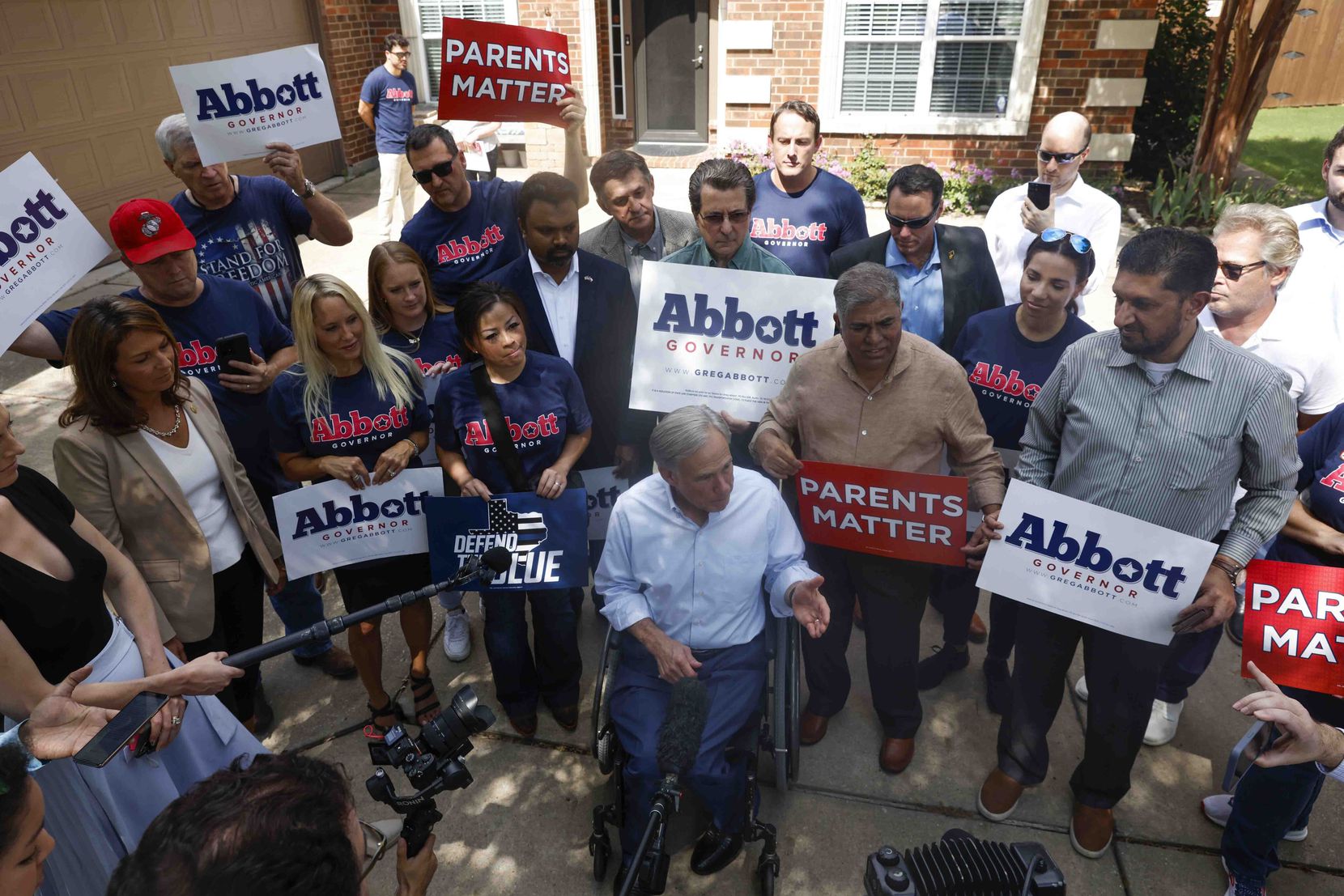 Texas Governor Greg Abbott answered questions from the members of the media as he campaigned...