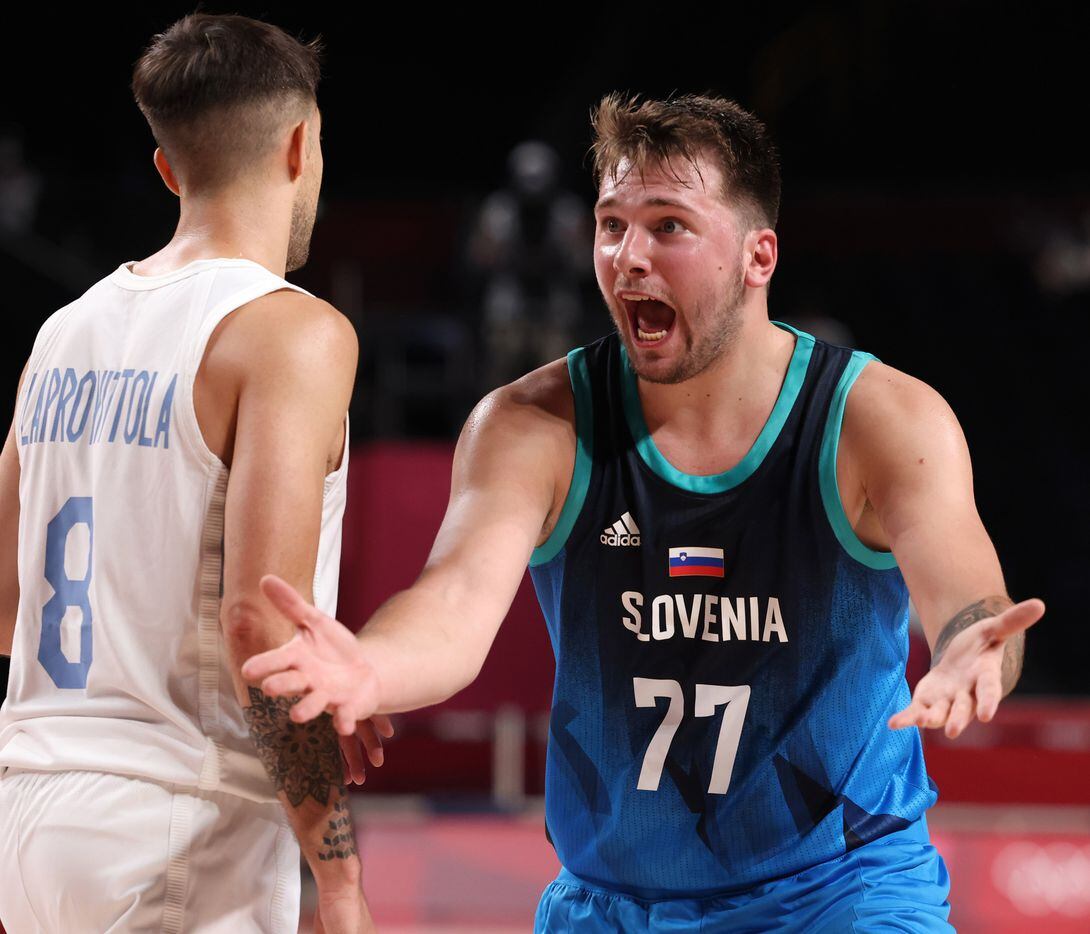 Slovenia’s Luka Doncic (77) reacts to a call signaling the ball was out on Slovenia after a play in the second half of play against Argentina during the postponed 2020 Tokyo Olympics at Saitama Super Arena on Monday, July 26, 2021, in Saitama, Japan. Slovenia defeated Argentina 118-100. (Vernon Bryant/The Dallas Morning News)
