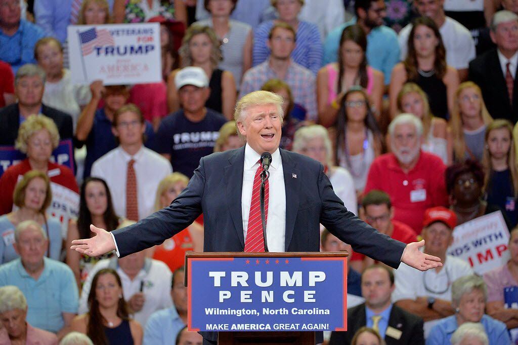 Republican presidential candidate Donald Trump addresses the audience during a campaign...