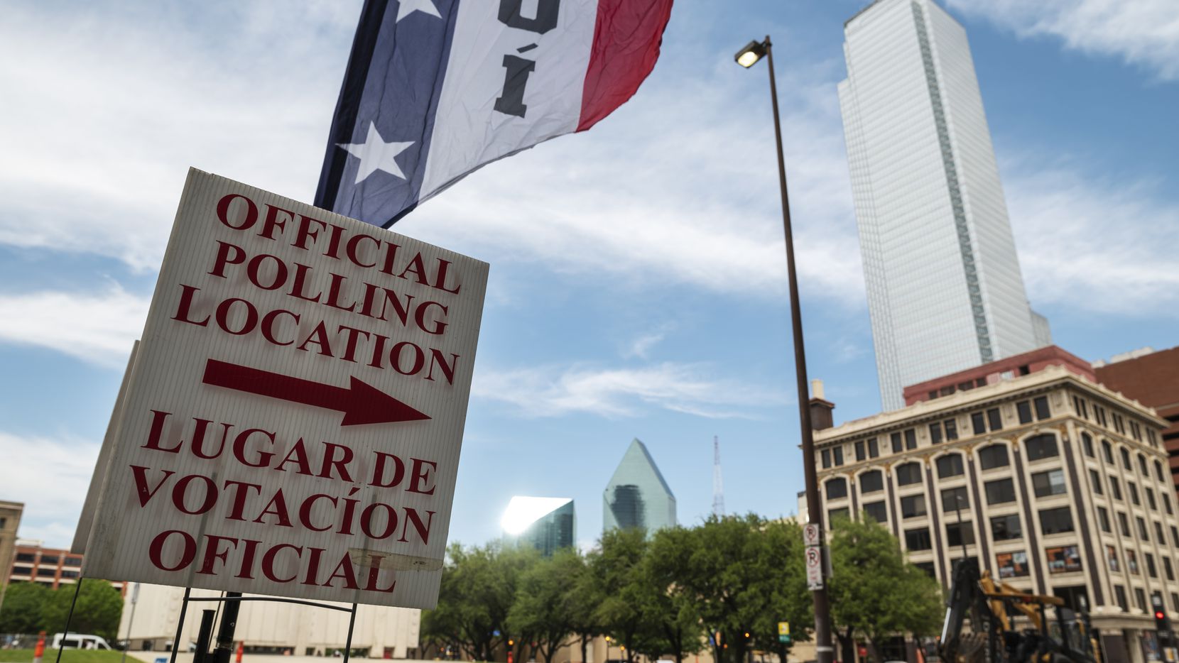 Signage marking an official polling location outside of the  George Allen Courts building in Downtown Dallas, during the first day of early voting, on Monday, April 19, 2021