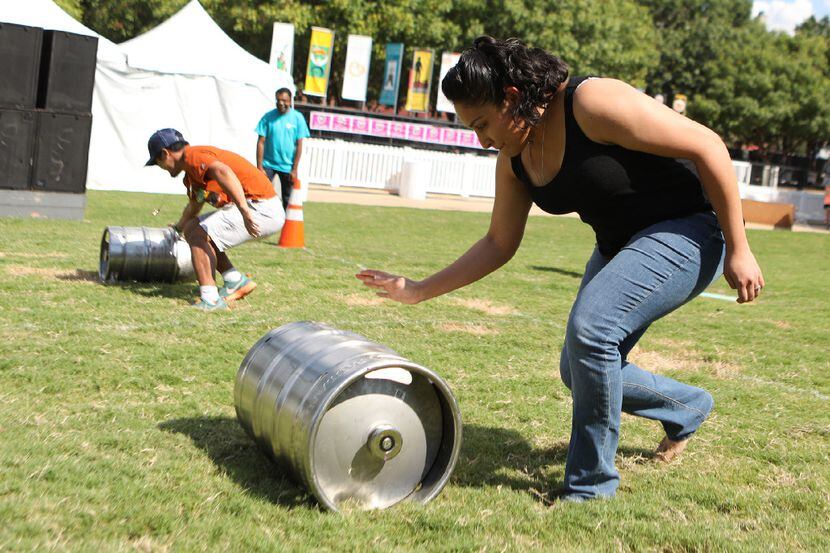 Melissa Jimenez competes in Bier Barrel Rolling during a past Addison Oktoberfest.