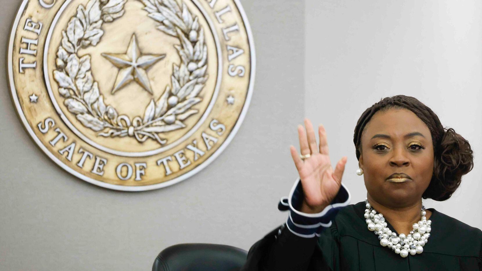 203rd District Court Judge Raquel "Rocky" Jones returns to the courtroom after a recess on...