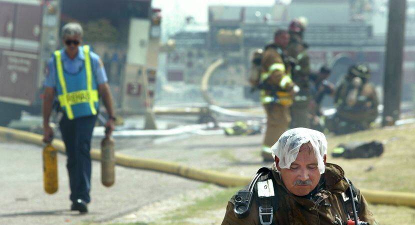 In this 2003 file photo, Michael Dorety took a break while battling a fire in Dallas. He...