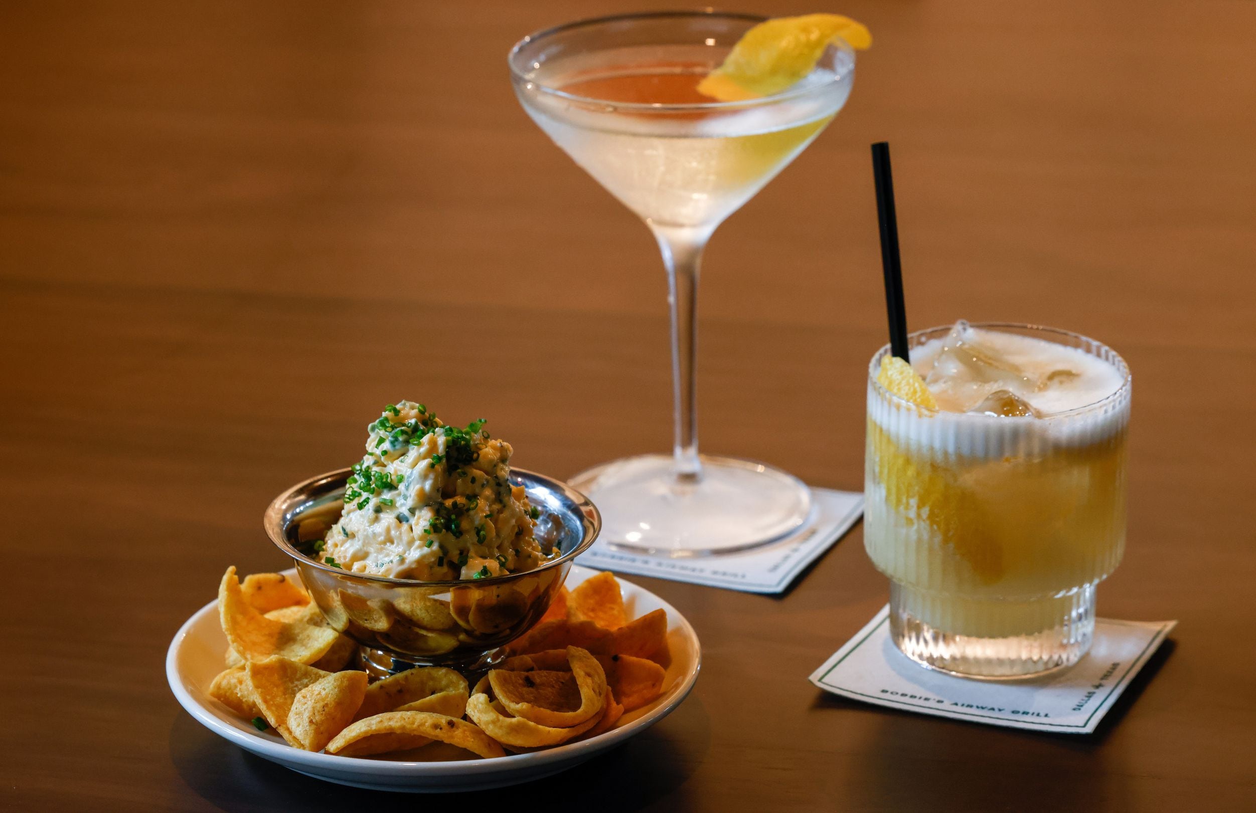 An Oaks Dip (left) is served alongside house cocktails at Bobbie's Airway Grill in the...