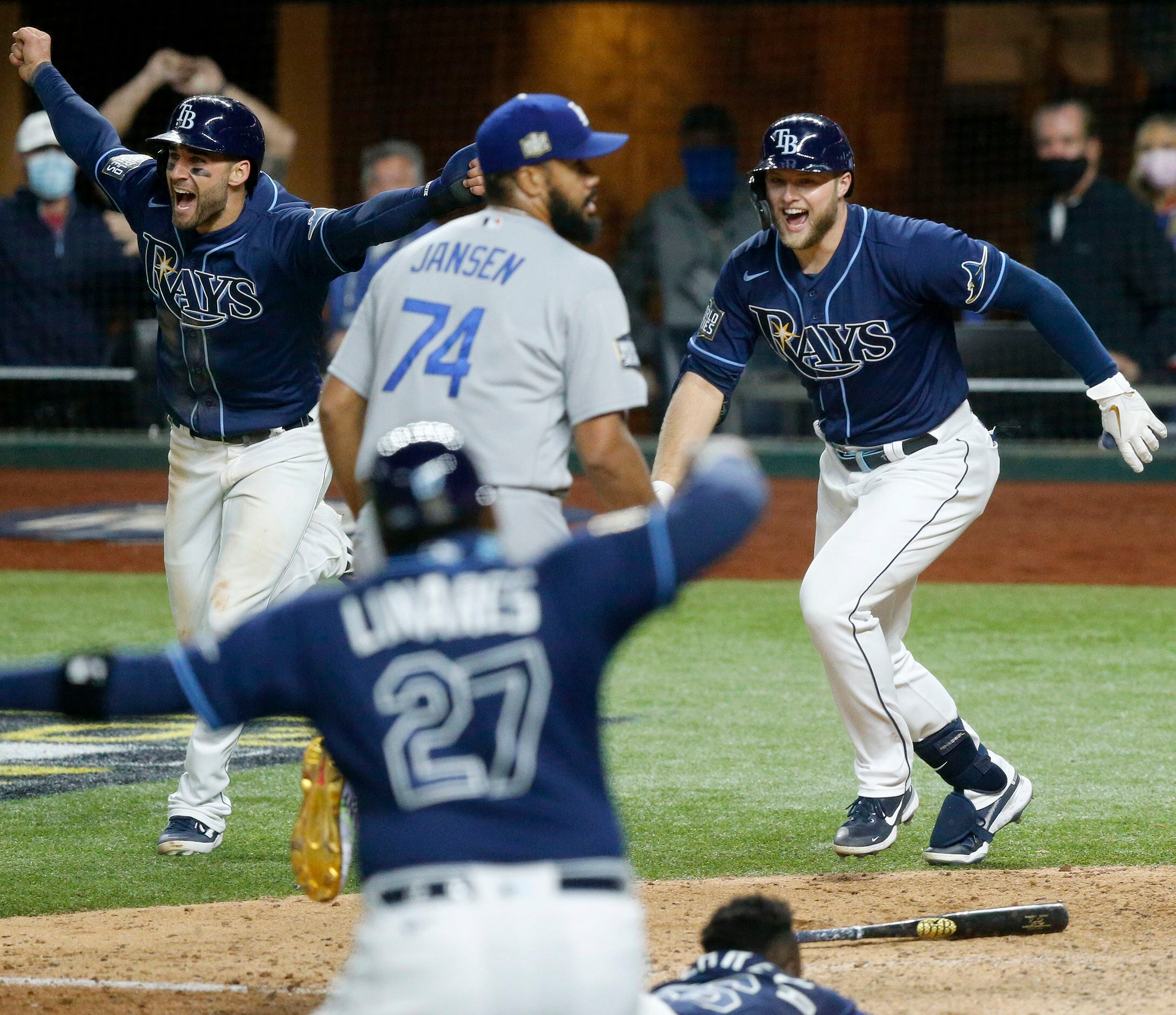 Photos: Randy Arozarena lays on home plate after game-winning run, Rays  celebrate victory over Dodgers
