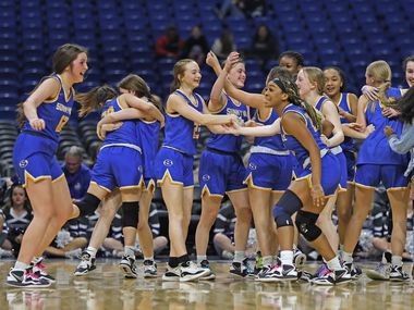 Sunnyvale celebrates at the end the game as Sunnyvale defeated Boerne girls basketball in...