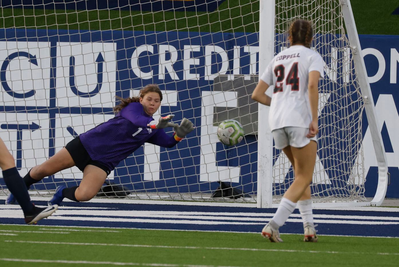 Allen’s goalkeeper Robbi Curry, left, saves a shot by Coppell’s Monica Morales during the...