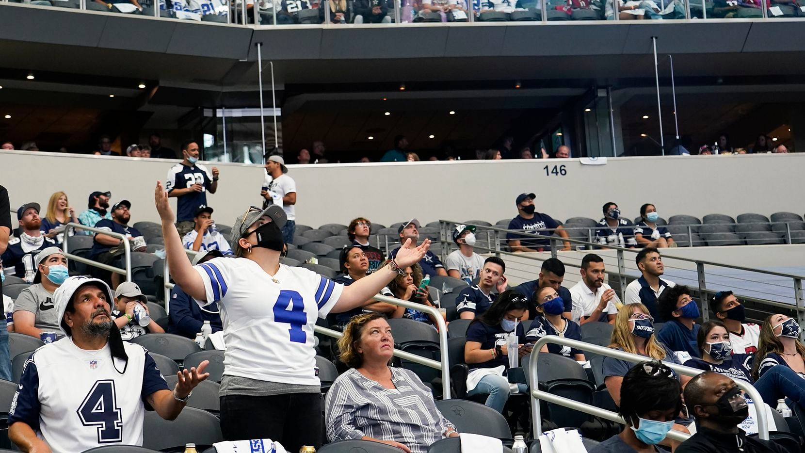 Dallas Cowboys fan reacts after a call went against their team during the second quarter of an NFL football game Atlanta Falcons at AT&T Stadium on Sunday, Sept. 20, 2020, in Arlington.