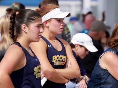 Highland Park’s Isabella McElfresh (right) and Eden Rogozinski watch the 5A boys doubles...