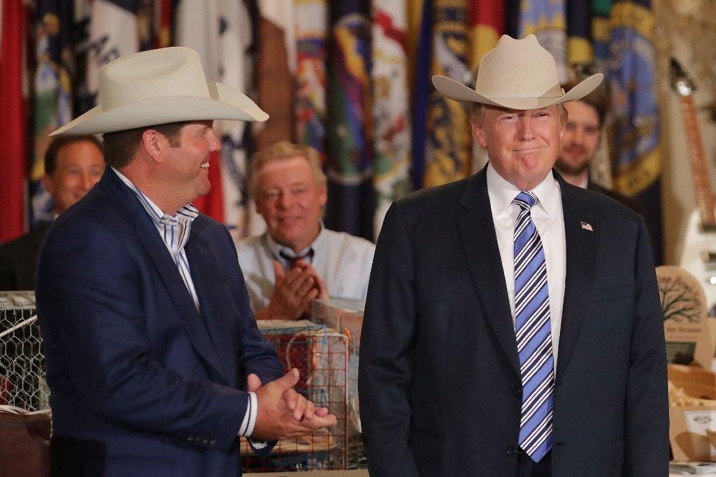 WASHINGTON, DC - JULY 17:  U.S. President Donald Trump wears a Stetson cowboy hat given to...