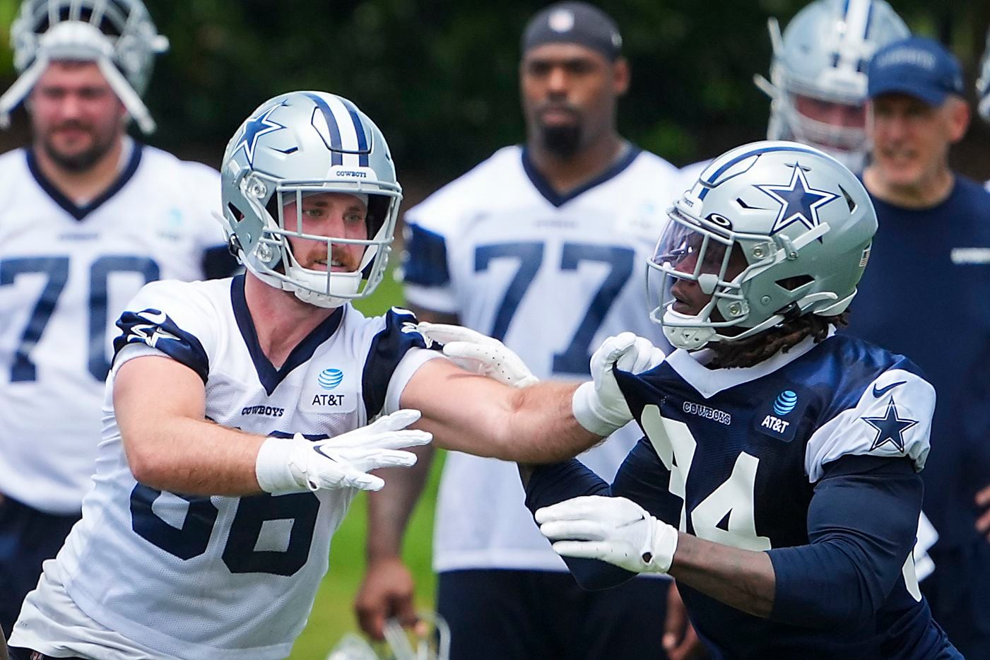 Dallas Cowboys tight end Dalton Schultz (86) works against defensive end Randy Gregory (94) during a minicamp practice at The Star on Tuesday, June 8, 2021, in Frisco. (Smiley N. Pool/The Dallas Morning News)