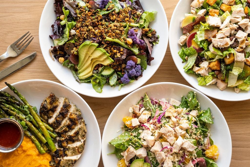 Clockwise from top left, Falaf salad, Wrangler spring salad, Zesty grain bowl and a Seasonal plate featuring herb roasted chicken breast with a spicy Korean bbq sauce and market sides of grilled asparagus and mashed sweet potatoes
at Mixt  in Uptown on Tuesday, May 7, 2019, in Dallas. (Smiley N. Pool/The Dallas Morning News)
