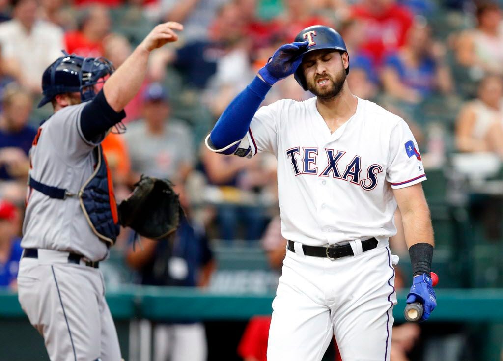 With bases loaded, Texas Rangers batter Joey Gallo strikes out in the third inning against...