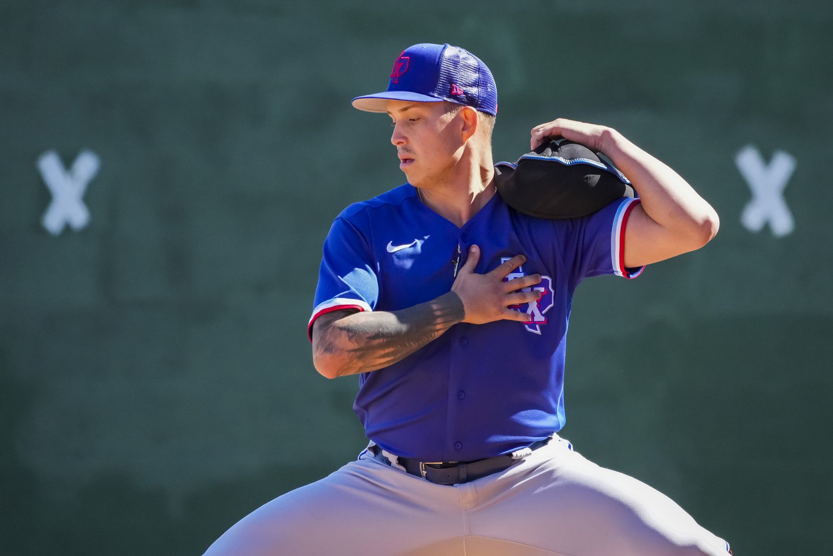 Pitcher Avery Weems works in the bullpen during a Texas Rangers minor league spring camp...