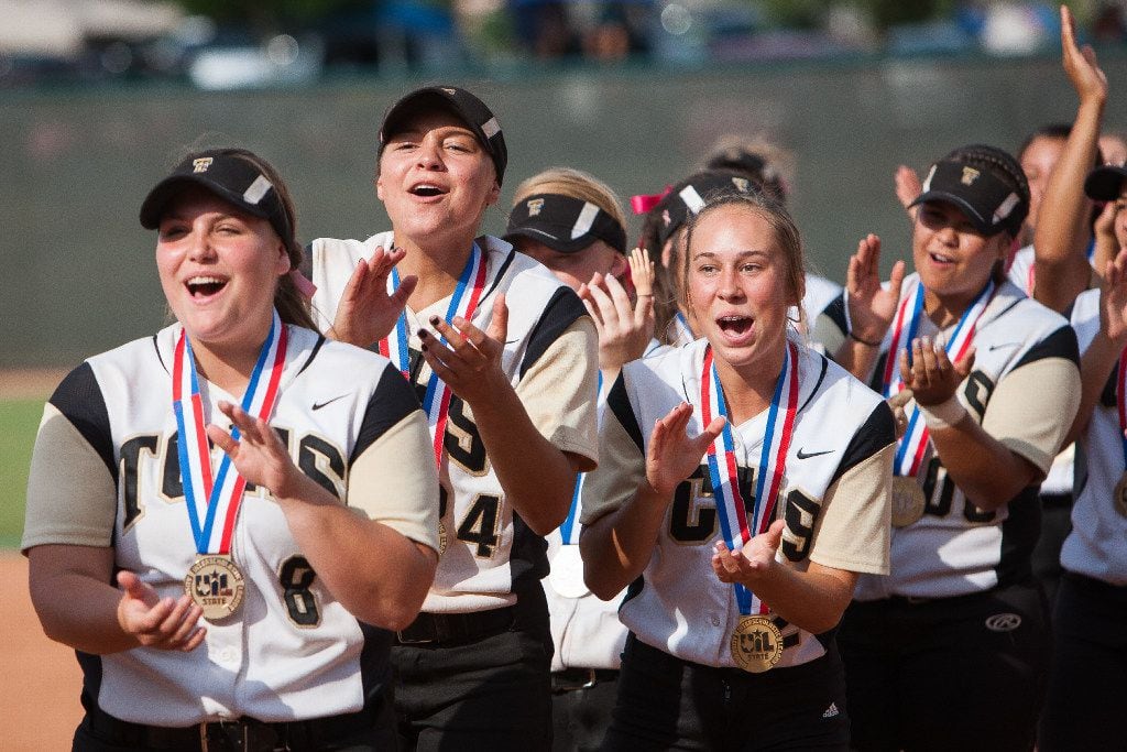 The Colony's (left to right) Brittany Maniloff, Jayda Coleman, and Jacee Hamlin cheer as pitcher Karlie Charles receives the MVP Award during the UIL 5A state softball championship at McCombs Field in Austin, Texas on Saturday June 3, 2017. The Colony Cougars defeated the Willis Wildkats 5-2.
(Julia Robinson/Special Contributor)