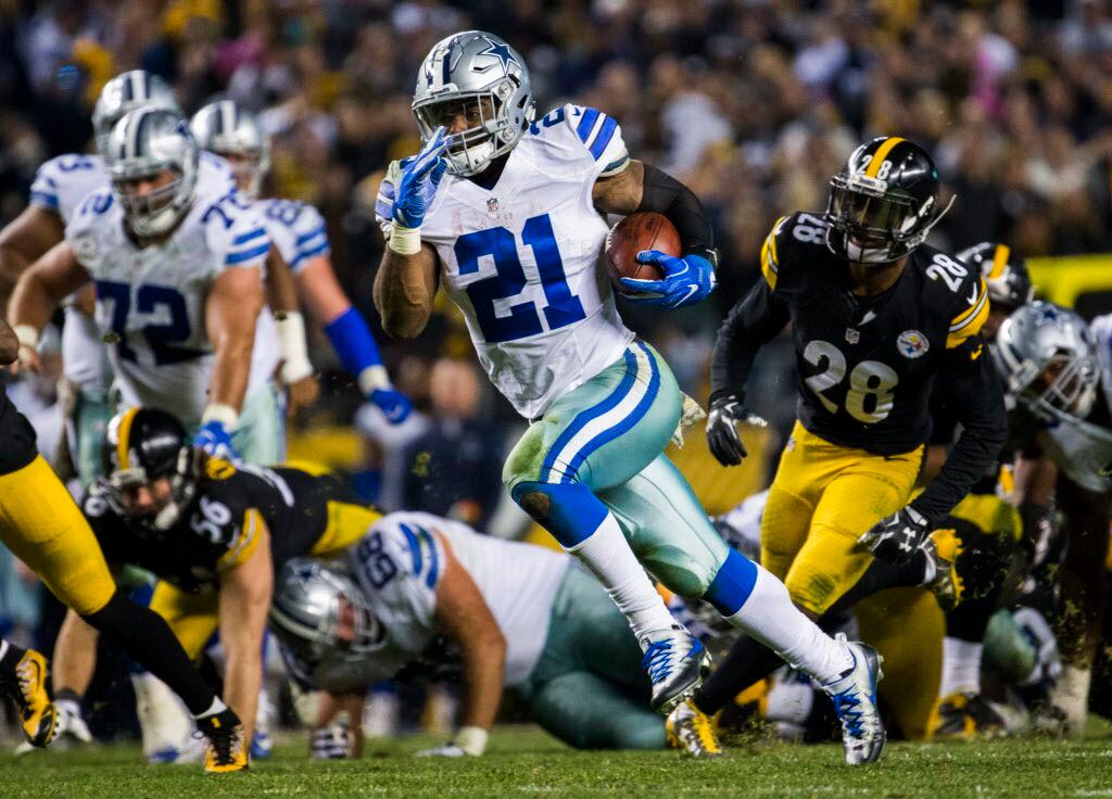 Dallas Cowboys running back Ezekiel Elliott (21) runs the ball to the end zone for the game...