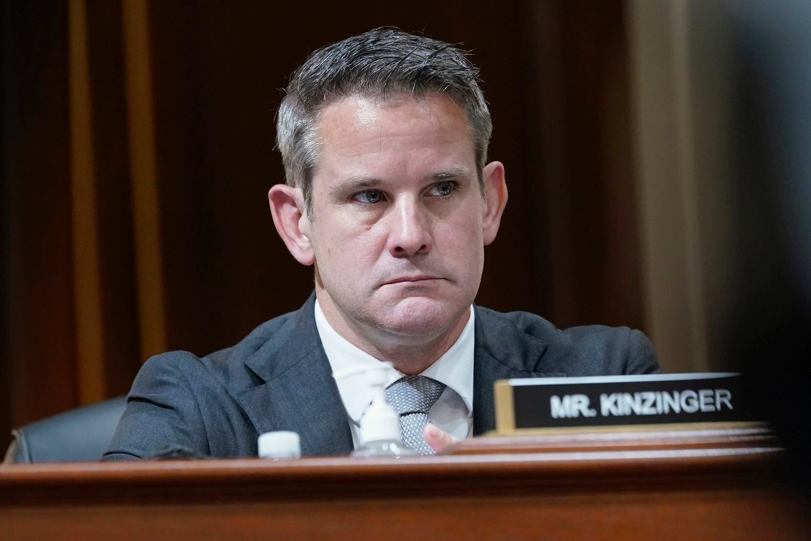 FILE - Rep. Adam Kinzinger, R-Ill., listens as the House select committee investigating the...
