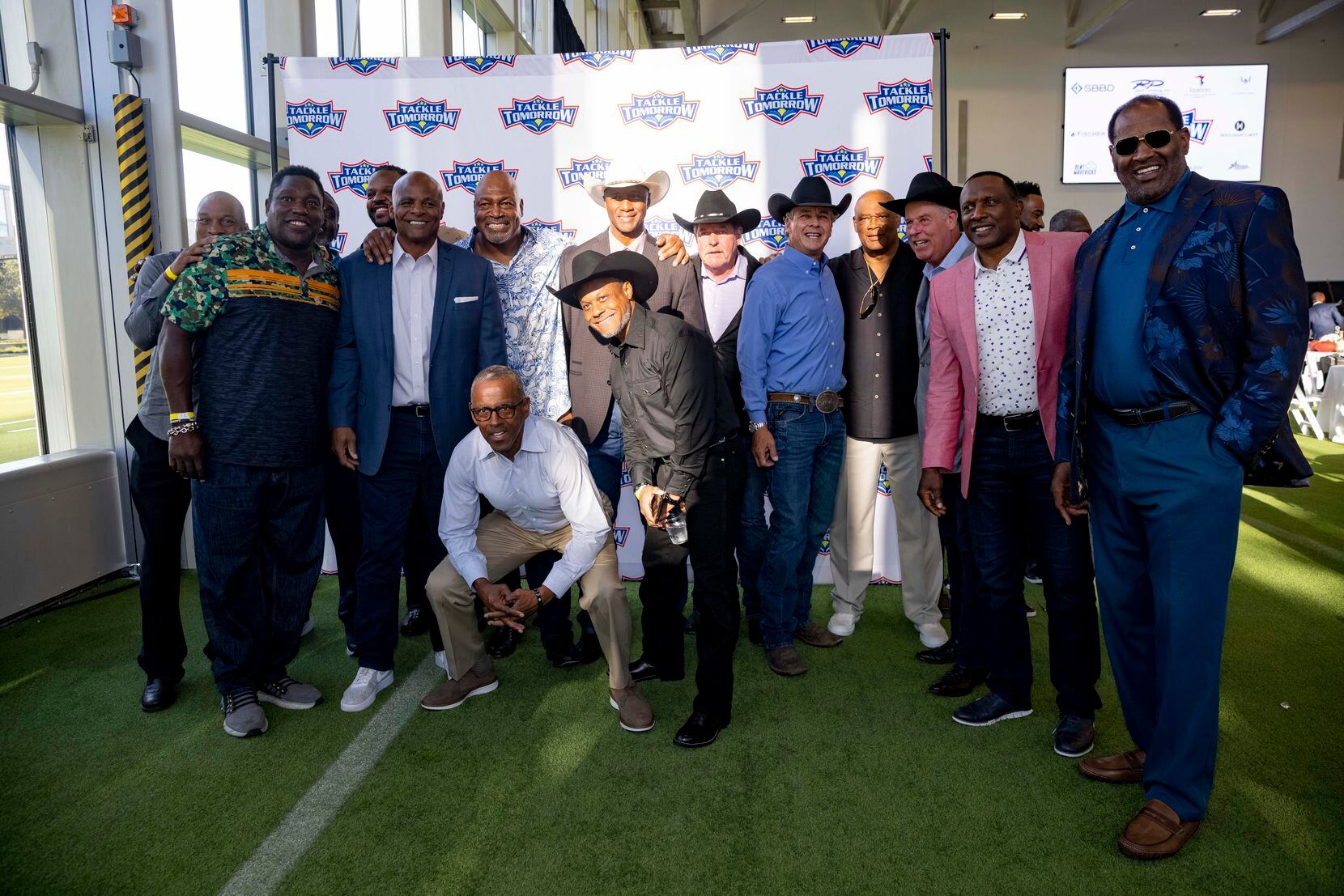Pro Football Hall of Famer and former Dallas Cowboys player Charles Haley poses with legends...