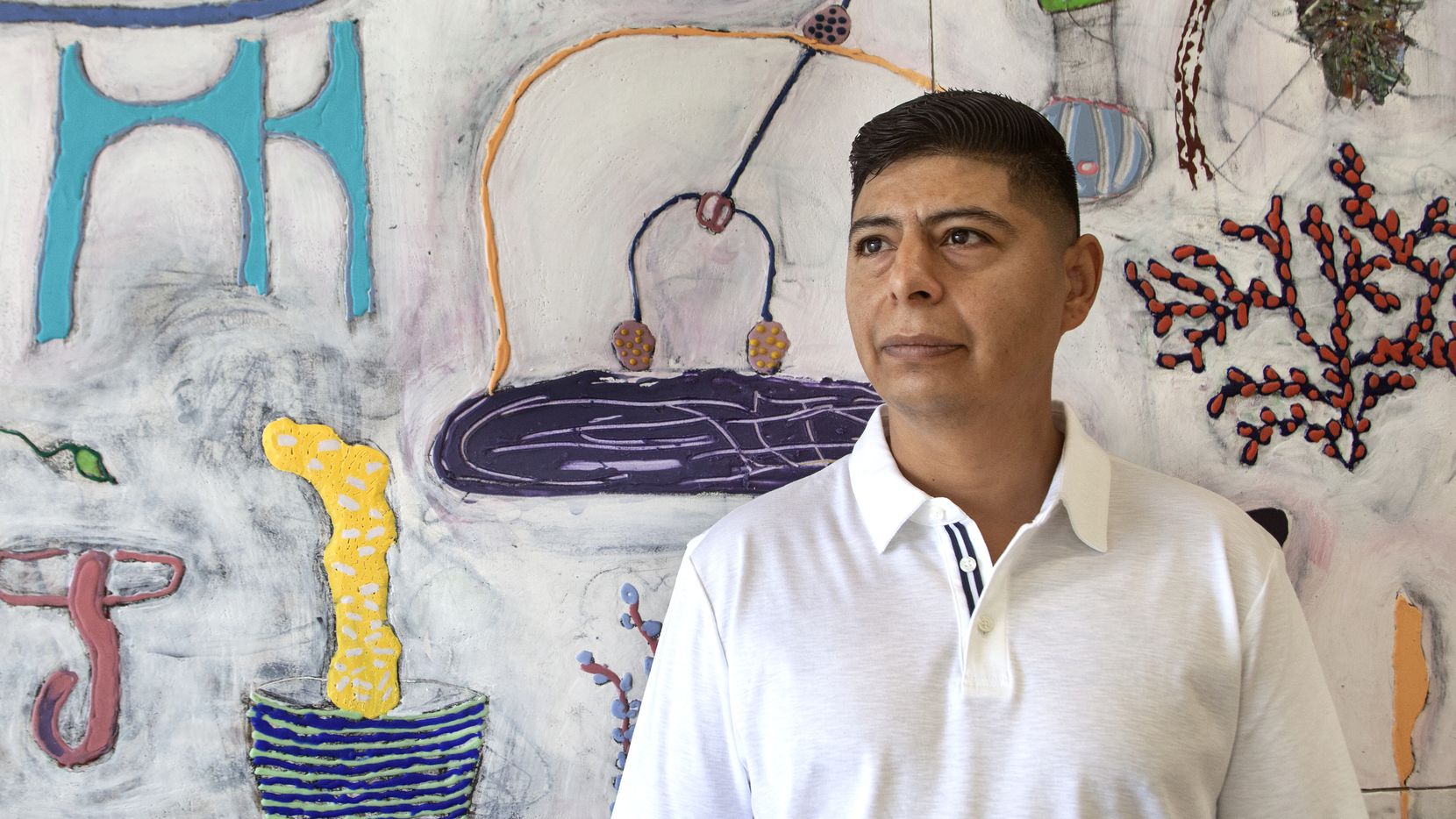 John Miranda, photographed at his exhibition "Movidas: New Work" at Cluley Projects, quit his job as an elementary school teacher to pursue a career as an artist. "I want to make a living out of what I like doing," he says. "Hopefully that will happen.”