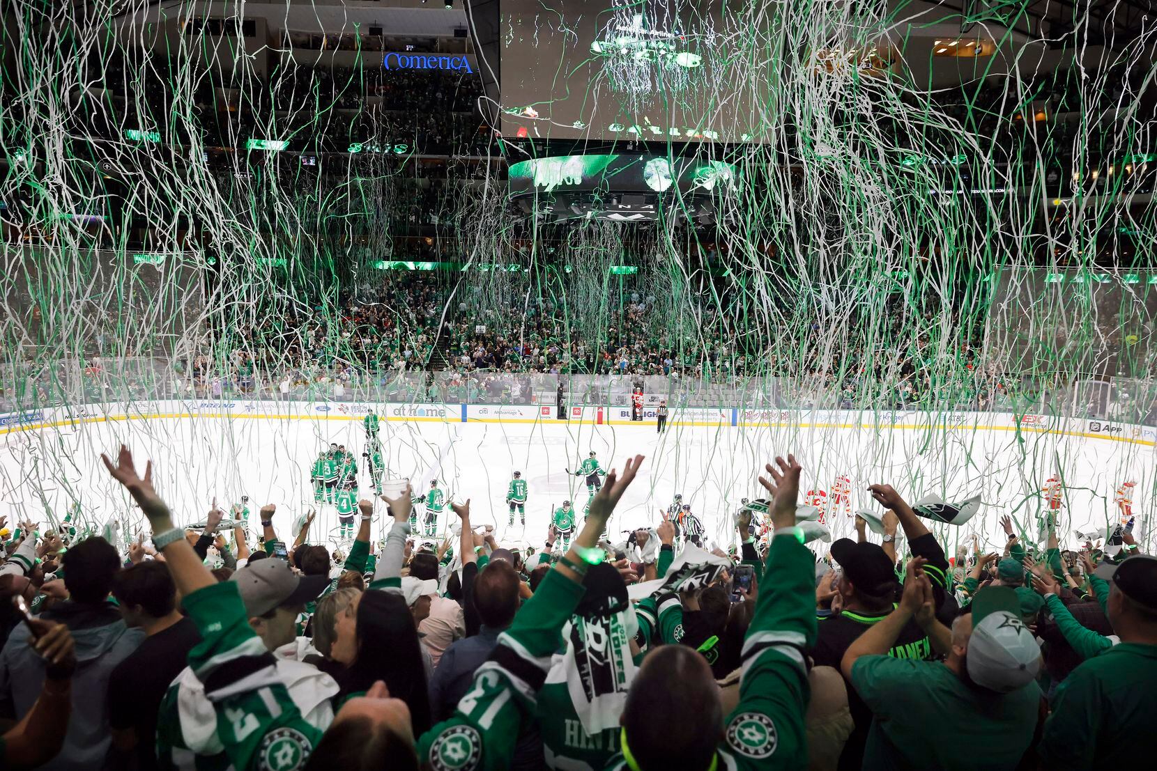 Paper streamers rain down on fans after the Dallas Stars defeated the Calgary Flames in Game...