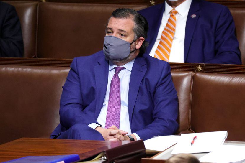 Sen. Ted Cruz sits in the House Chamber during a joint session of Congress on Jan. 6, 2021,...